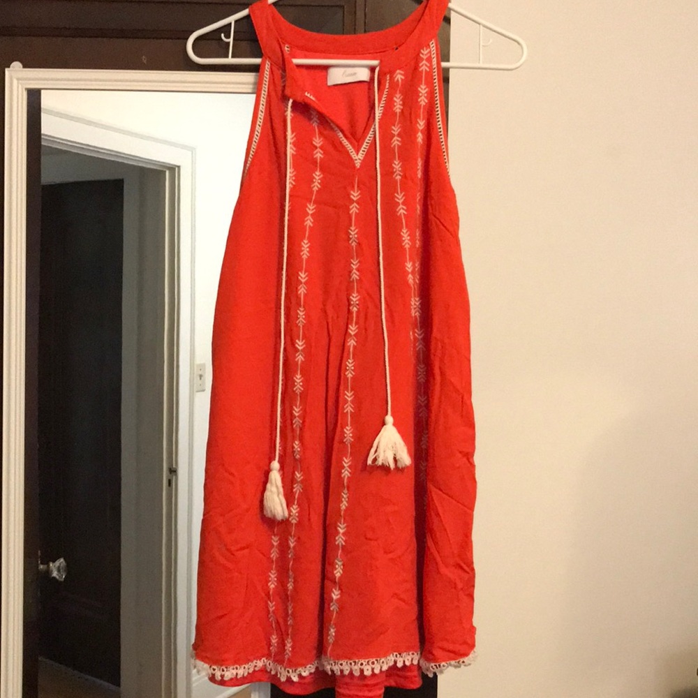 Orange dress with cute tassels